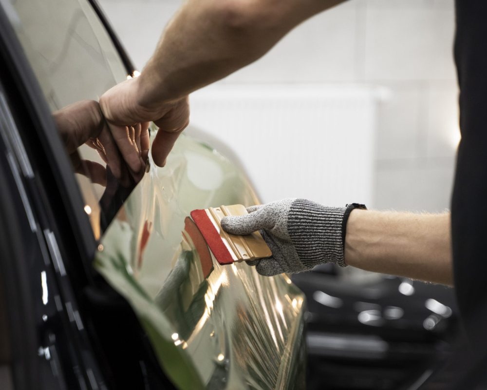 person-working-car-wrapping